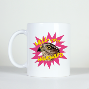 animal pun mug saying well that was hawk-ward with an image of a hawk with pink background
